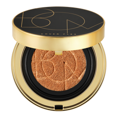 Gold compact powder with a black lid